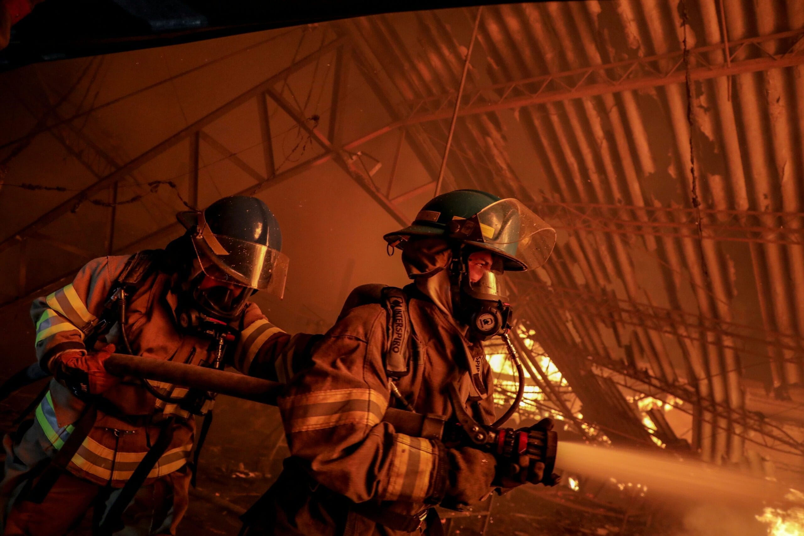 Firefighters competing in a stadium event during the World Firefighters Games